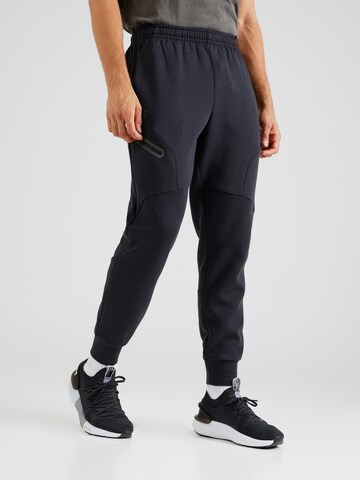 Effilé Pantalon de sport 'Unstoppable' UNDER ARMOUR en noir