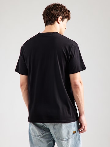 Carhartt WIP T-Shirt 'Rising Helix' in Schwarz
