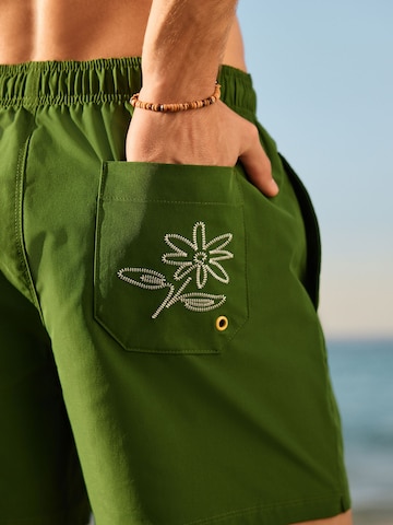 žalia Next Maudymosi trumpikės