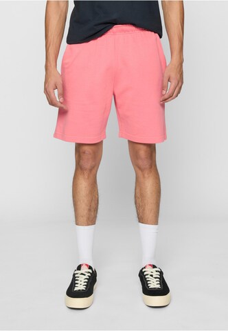 regular Pantaloni di Urban Classics in rosa: frontale