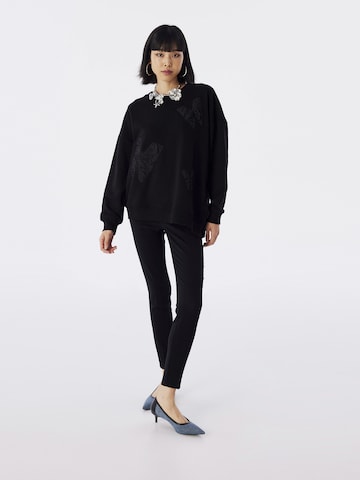 Twist Sweatshirt in Schwarz