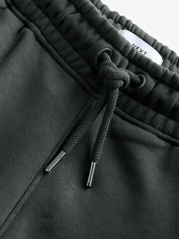 Tapered Pantaloni di Next in grigio