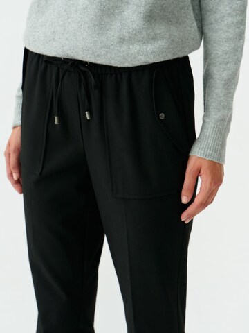 TATUUM Slimfit Spodnie 'SANI' w kolorze czarny