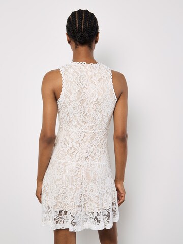 Apricot Cocktail dress in White