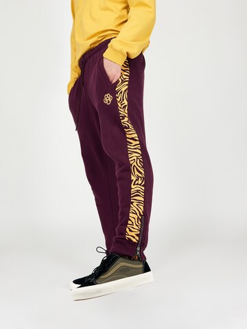 Magdeburg Los Angeles Loose fit Pants in Purple: back