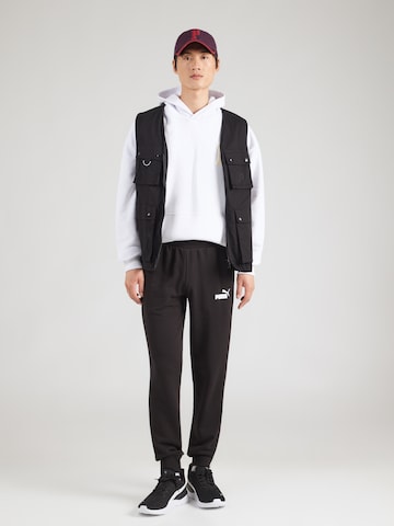 PUMA Конический (Tapered) Спортивные штаны 'ESS' в Черный