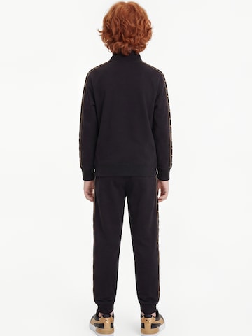 PUMA Sweatsuit 'Ess' in Black