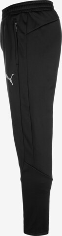 PUMAregular Sportske hlače 'EVOSTRIPE' - crna boja