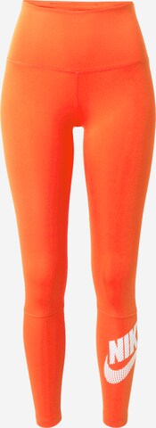 Skinny Pantalon de sport NIKE en orange : devant