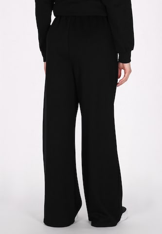 faina Athlsr - Loosefit Calças 'Fashion Look' em preto