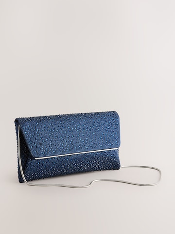Next Clutch i blå