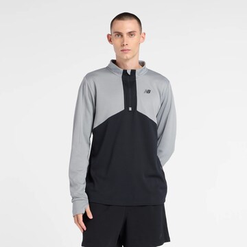 Pull-over de sport new balance en noir : devant