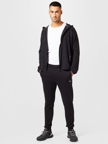 Champion Authentic Athletic Apparel Tapered Sports trousers in Black