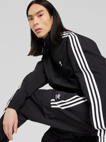 ADIDAS ORIGINALS Jacke in Schwarz