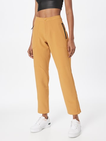 PUMA Regular Workout Pants in Beige: front