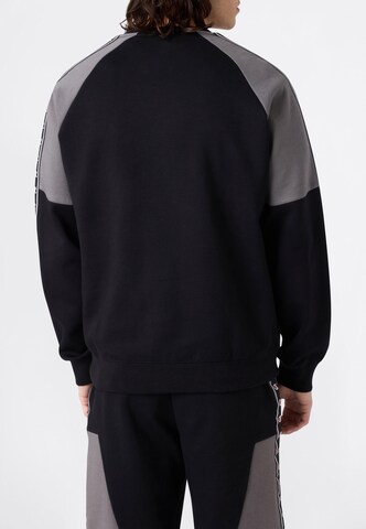 Champion Authentic Athletic Apparel Sweatshirt in Black