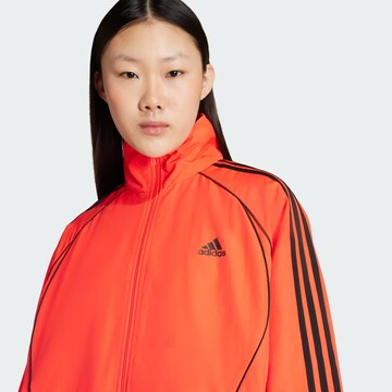 ADIDAS ORIGINALS - Casaco meia-estação 'Teamgeist Adicolor' em vermelho