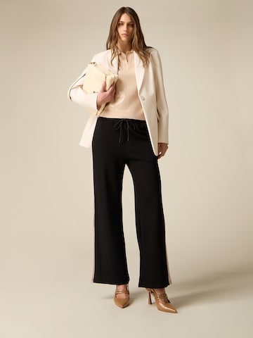oltre Baggy Trousers in Black