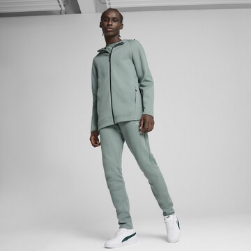 PUMA Sports sweat jacket 'EVOSTRIPE' in Green