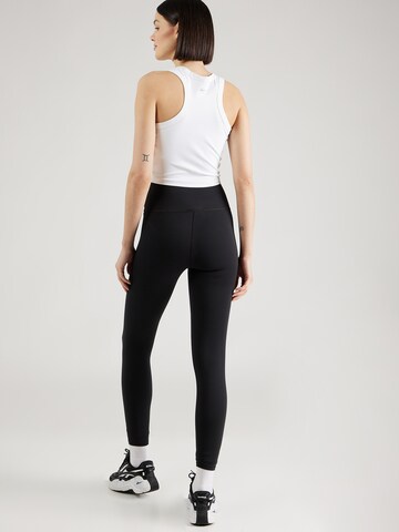 new balanceSkinny Sportske hlače 'Essentials Harmony' - crna boja