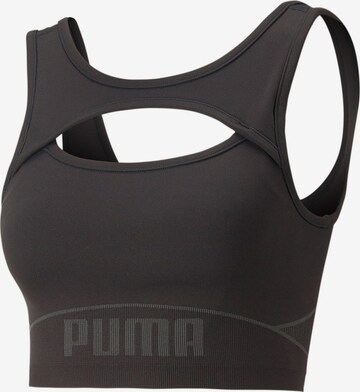 Reggiseno sportivo di PUMA in nero: frontale