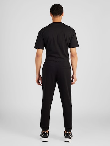 melns Calvin Klein Jeans Pakapēniski sašaurināts piegriezums Bikses