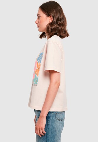Merchcode T-Shirt 'Happiness Blooms Here' in Pink
