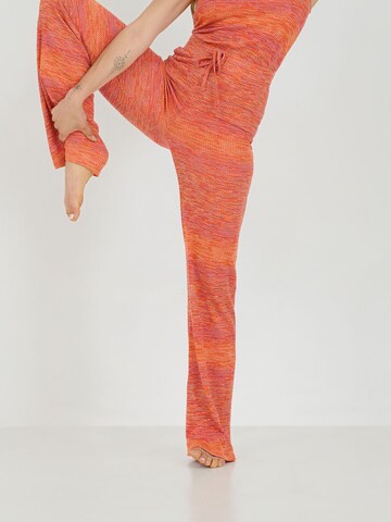 ABOUT YOU x Sofia Tsakiridou Loosefit Hose 'Lia' in Orange