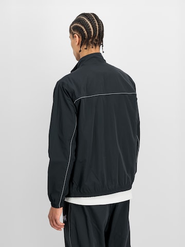 ALPHA INDUSTRIES Between-Season Jacket 'Ptg' in Black: back
