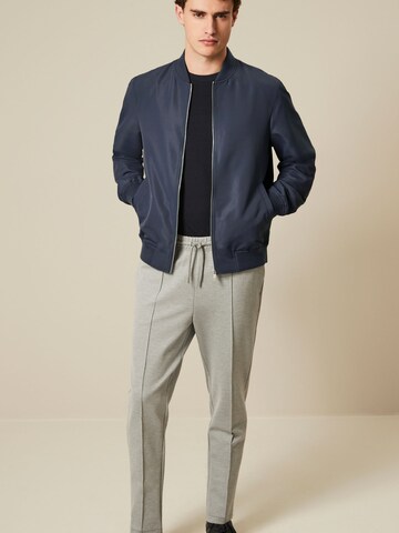 Next Tussenjas in Blauw