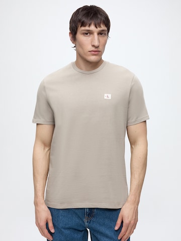 Calvin Klein Jeans Póló - bézs: elől