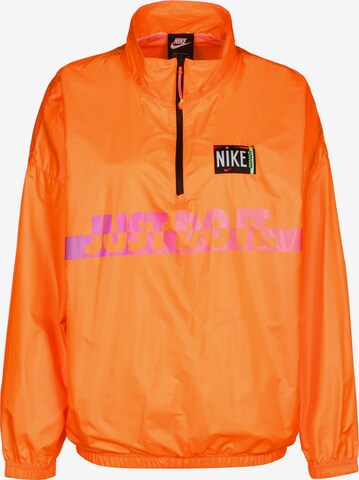 Nike Sportswear Tussenjas in Oranje: voorkant