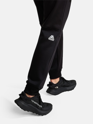 THE NORTH FACE - Tapered Pantalón de montaña 'MOUNTAIN ATHLETICS' en negro
