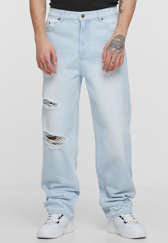 Karl Kani Tapered Jeans in Blue: front