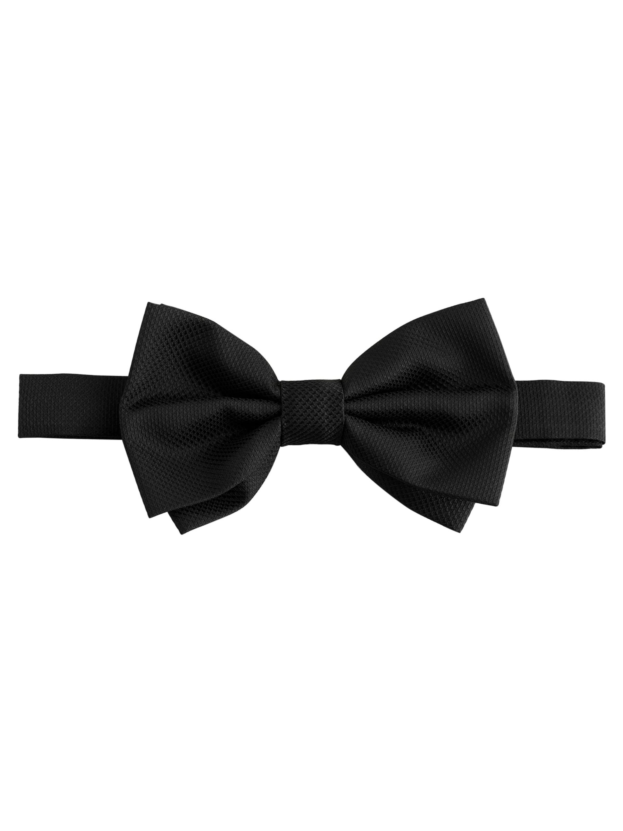 Papion de la Next pe negru: față