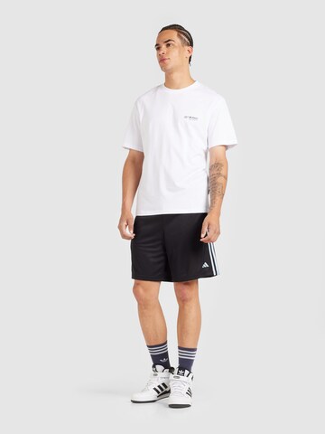 ADIDAS PERFORMANCE - Loosefit Pantalón deportivo en negro