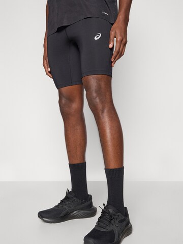 ASICS Skinny Workout Pants 'Core' in Black: front