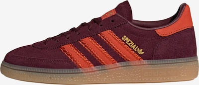 Sportbačiai be auliuko 'Handball Spezial' iš ADIDAS ORIGINALS, spalva – Auksas / tamsiai oranžinė / vyno raudona spalva, Prekių apžvalga
