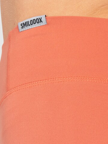 Smilodox Skinny Workout Pants 'Advance Pro' in Orange