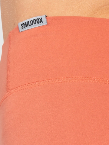 Smilodox Skinny Shorts 'Advance Pro' in Orange