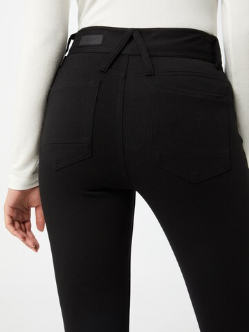 Skinny Pantaloni de la DKNY pe negru