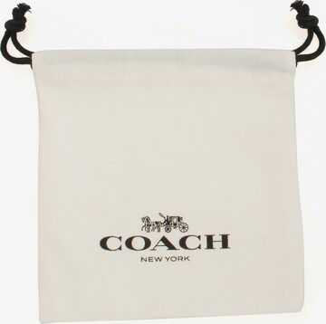 Orecchini di COACH in oro