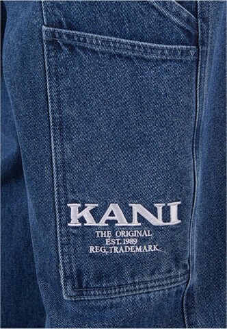 Karl Kani Tapered Pleated Jeans in Blue