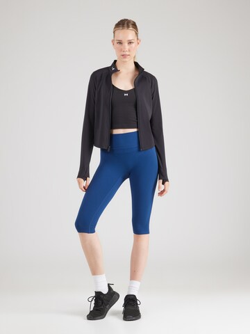 UNDER ARMOUR Sporttop 'Motion' in Zwart