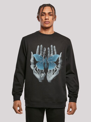 F4NT4STIC Sweatshirt 'Skelett Hände Schmetterling' in Black: front