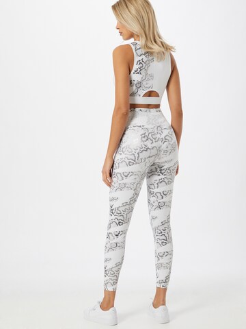 Skinny Pantalon de sport PUMA en blanc