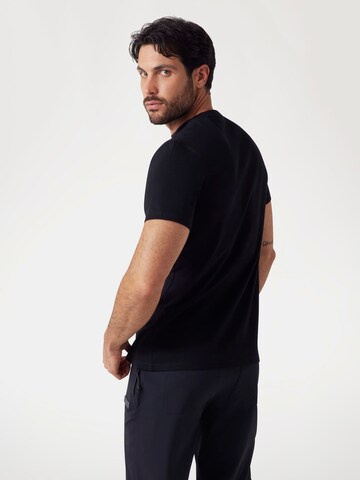 GUESS T-Shirt in Schwarz