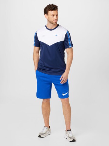 T-Shirt 'REPEAT' Nike Sportswear en bleu