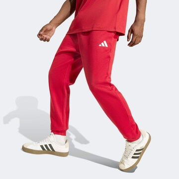 ADIDAS SPORTSWEAR Tapered Workout Pants in Red