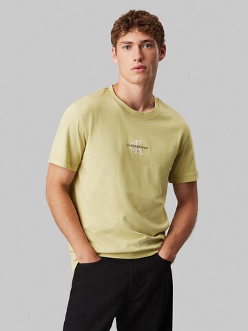 Regular T-Shirt Calvin Klein Jeans en jaune : devant